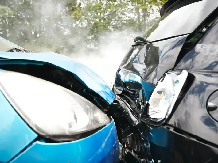 Peoria AZ injury law office meeting with client about medical bills and insurance claim after DUI crash